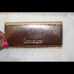 Michael Kors gold colored leather wallet, new